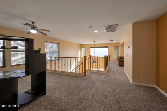 a view of a hallway with workspace
