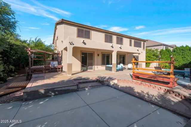 a view of a building with car parked