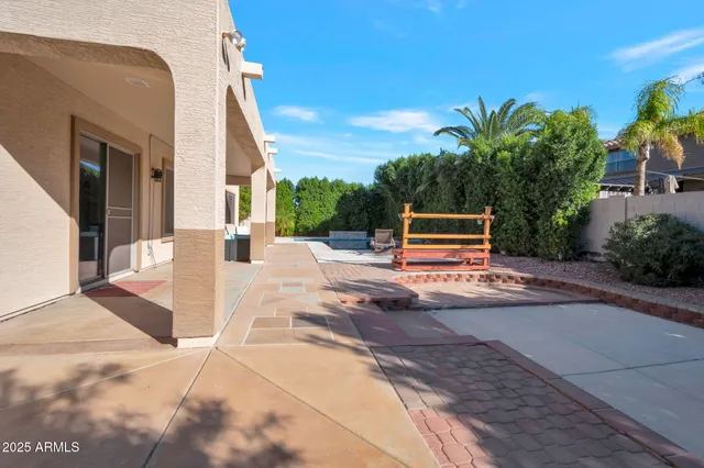 a view of the house with potted plants
