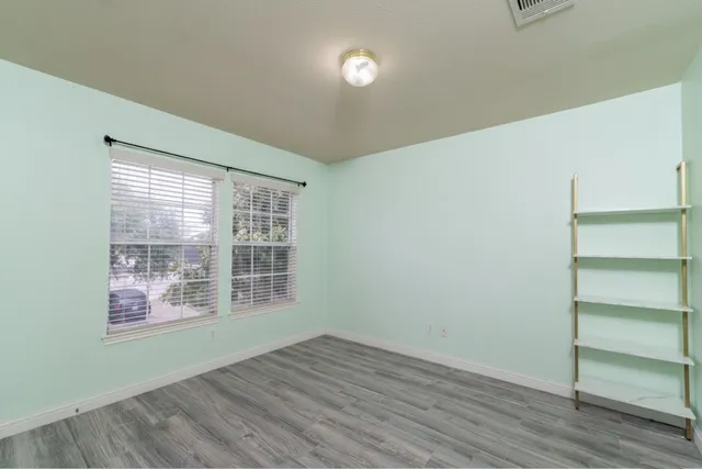 a view of an empty walk in closet