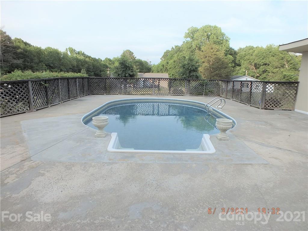 1473 Old Landsford Road Lancaster, SC 29720 - Photo 2 of 29 a view of a swimming pool with a lake view