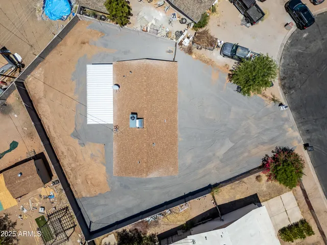 an aerial view of residential house with outdoor space