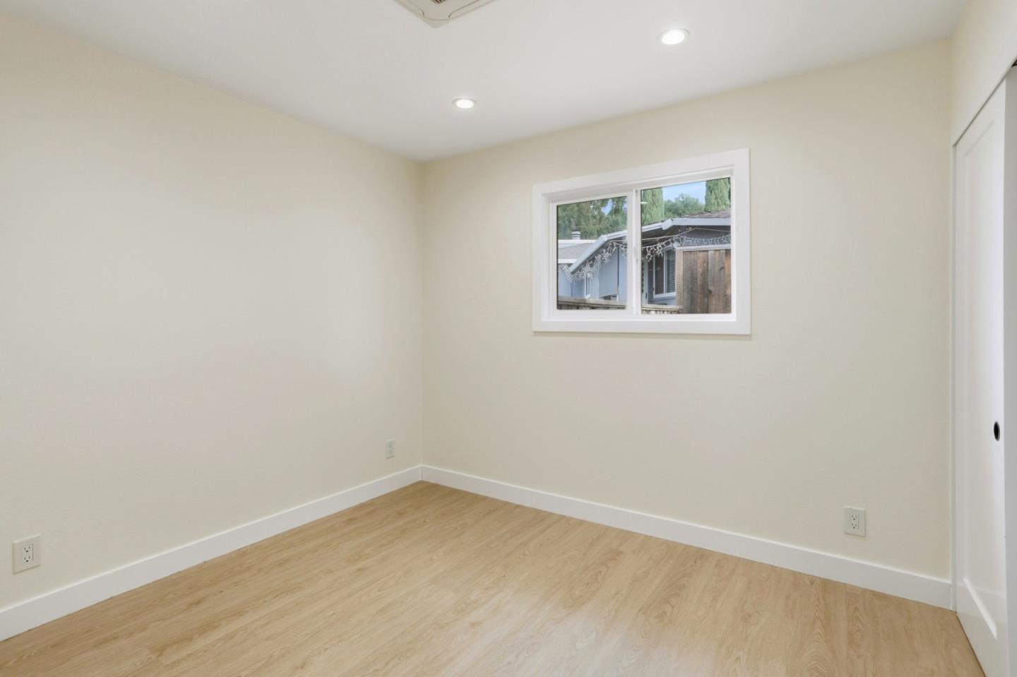 474 Oliver Street Milpitas, CA 95035 - Photo 13 of 27 an empty room with a window