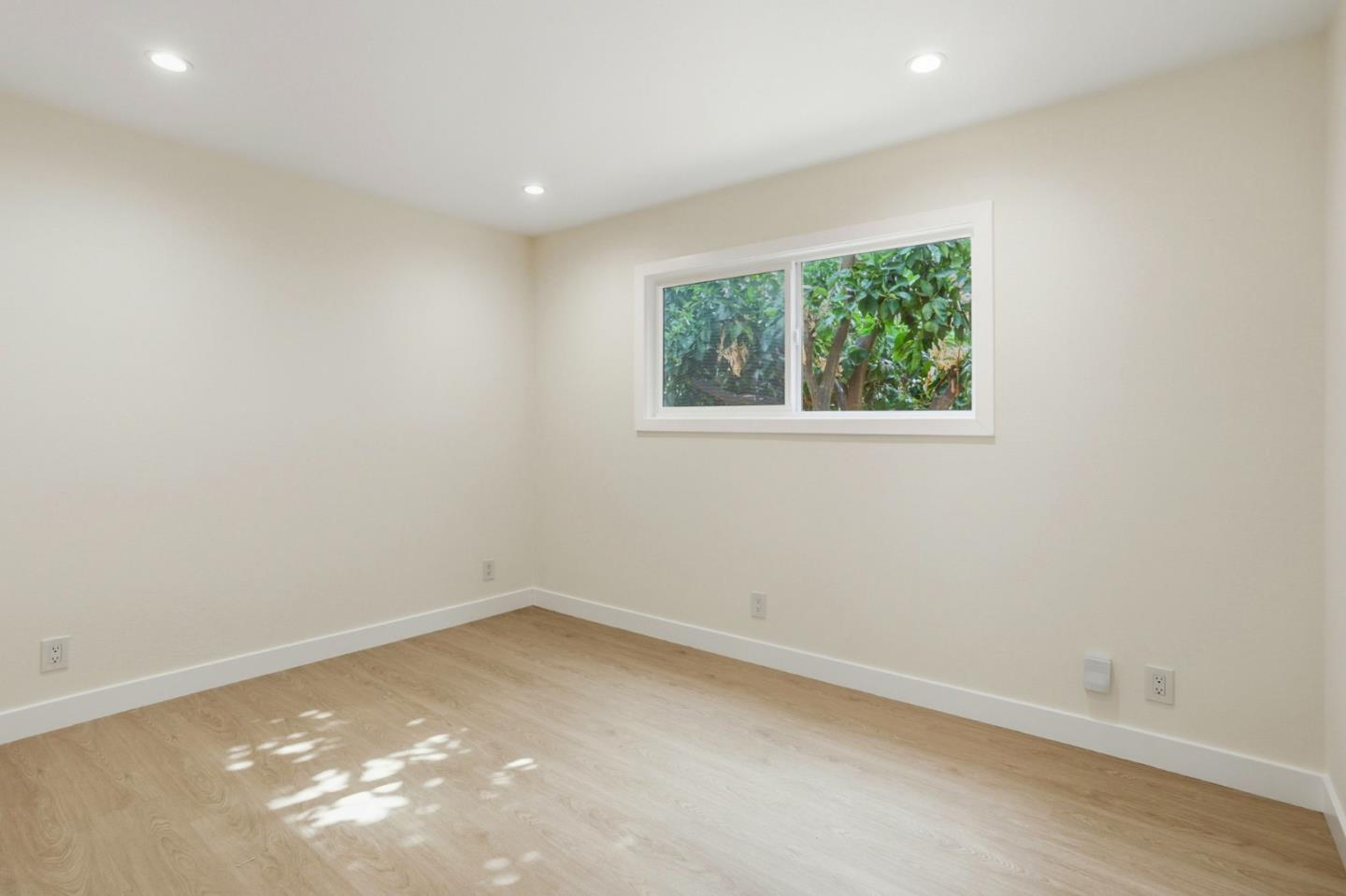 474 Oliver Street Milpitas, CA 95035 - Photo 14 of 27 an empty room with a window