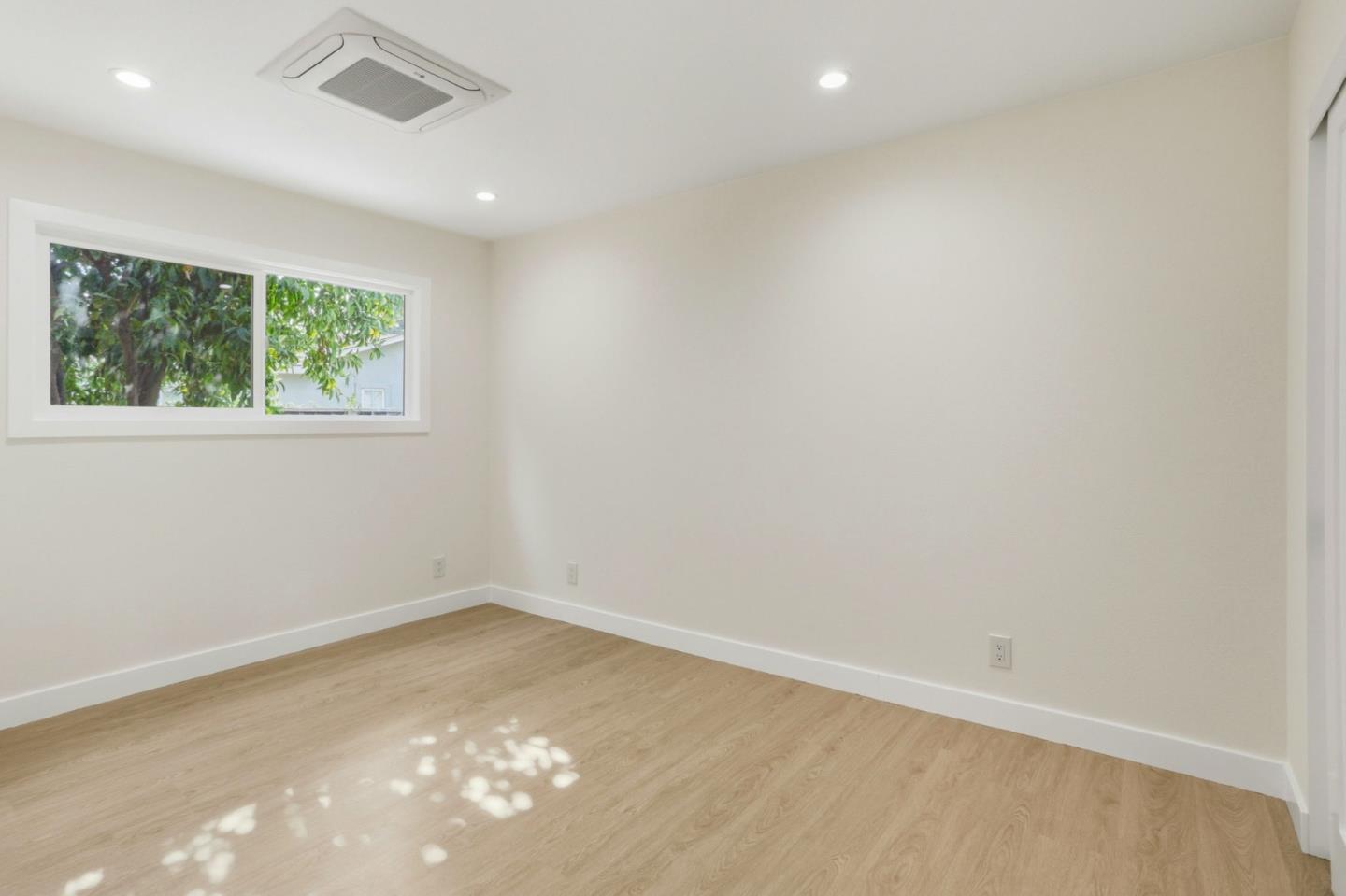 474 Oliver Street Milpitas, CA 95035 - Photo 15 of 27 an empty room with a window