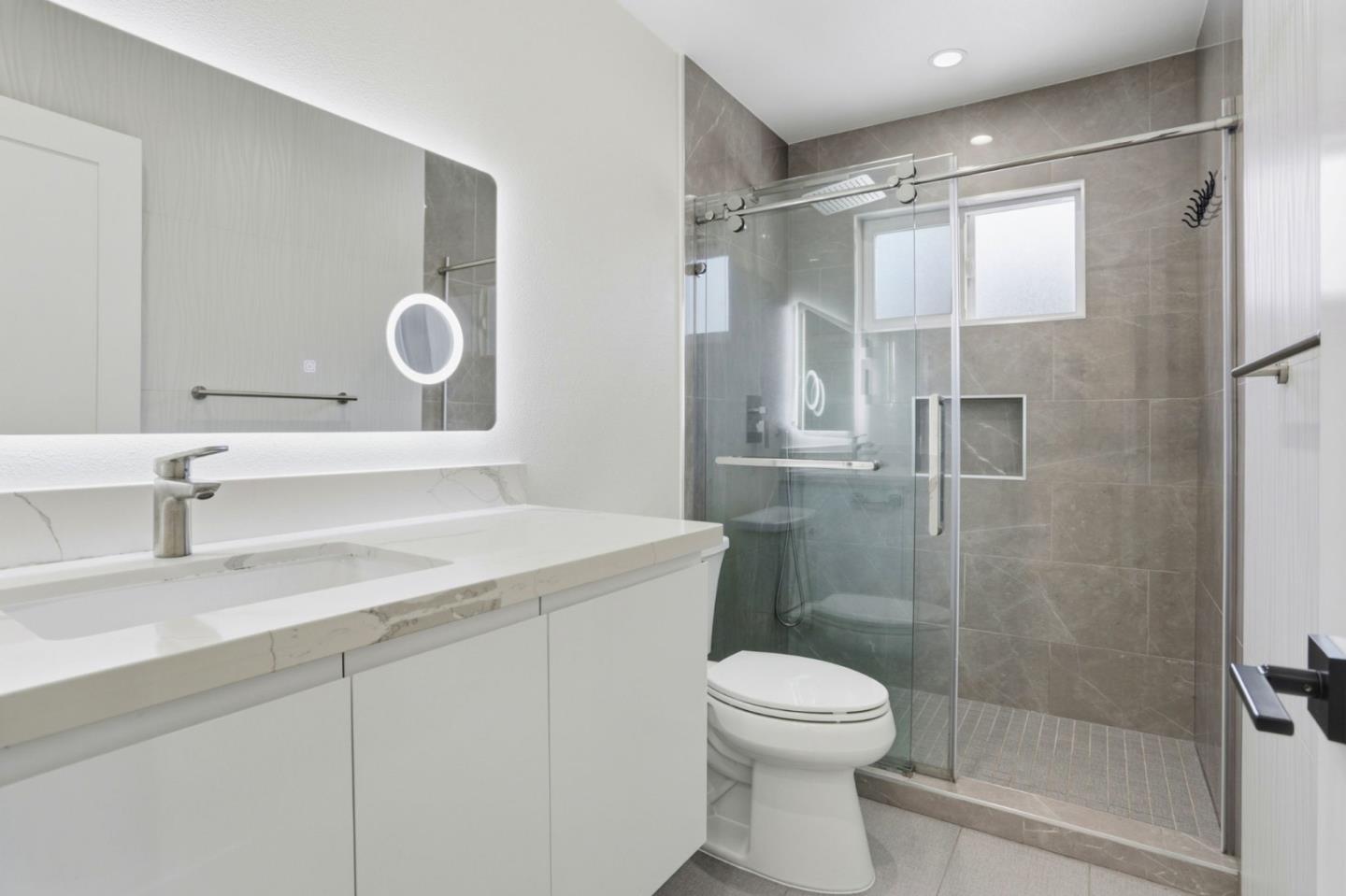 474 Oliver Street Milpitas, CA 95035 - Photo 20 of 27 a bathroom with a sink and a mirror