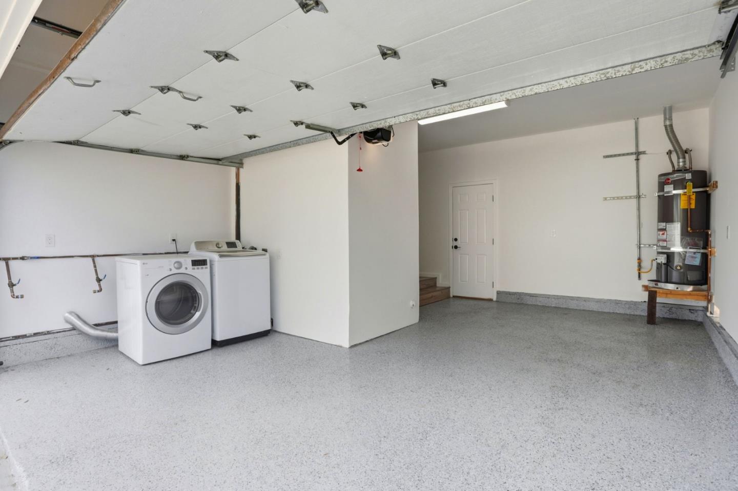 474 Oliver Street Milpitas, CA 95035 - Photo 23 of 27 a view of a storage & utility room with two washing machine