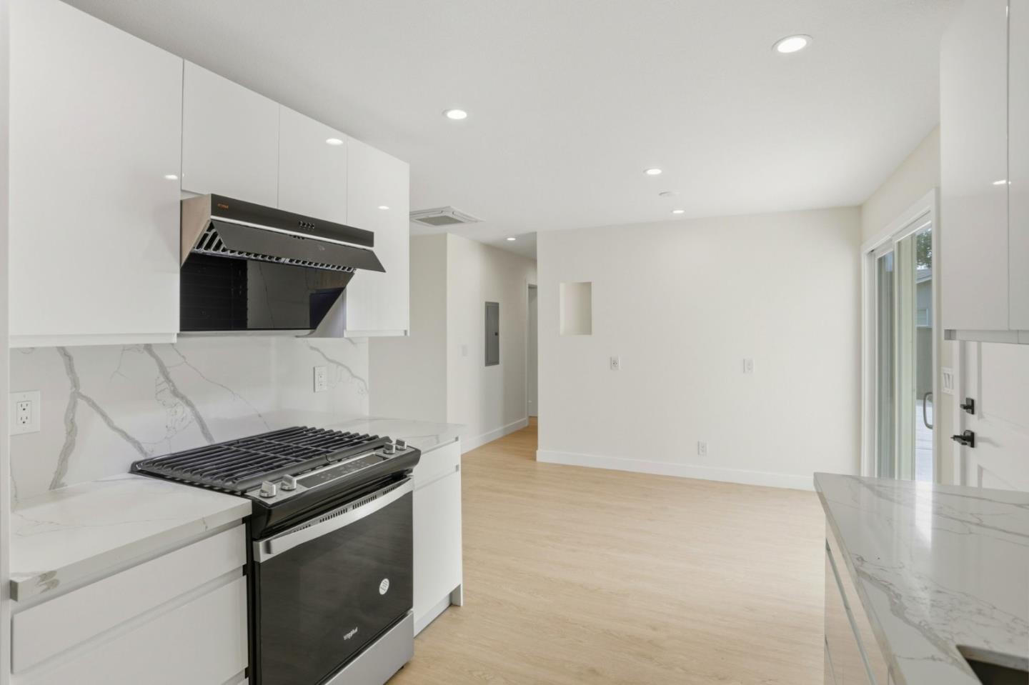 474 Oliver Street Milpitas, CA 95035 - Photo 10 of 27 a kitchen with stainless steel appliances granite countertop a stove and a refrigerator