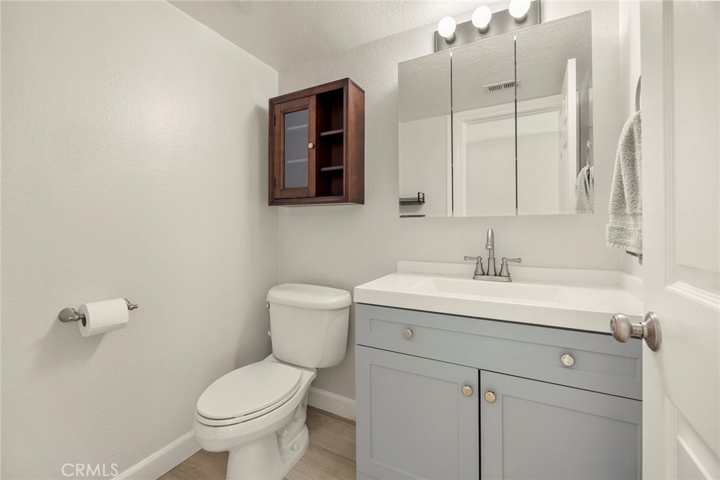 25885 Trabuco Road, Unit 101 Lake Forest, CA 92630 - Photo 7 of 28 DOWNSTAIRS 1/2 BATH