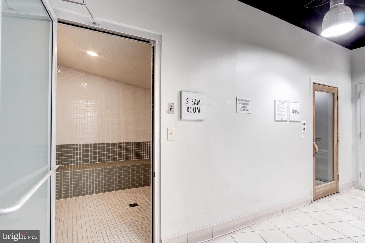 1011 Arlington Boulevard, Unit 930 Arlington, VA 22209 - Photo 21 of 42 a bathroom with a shower