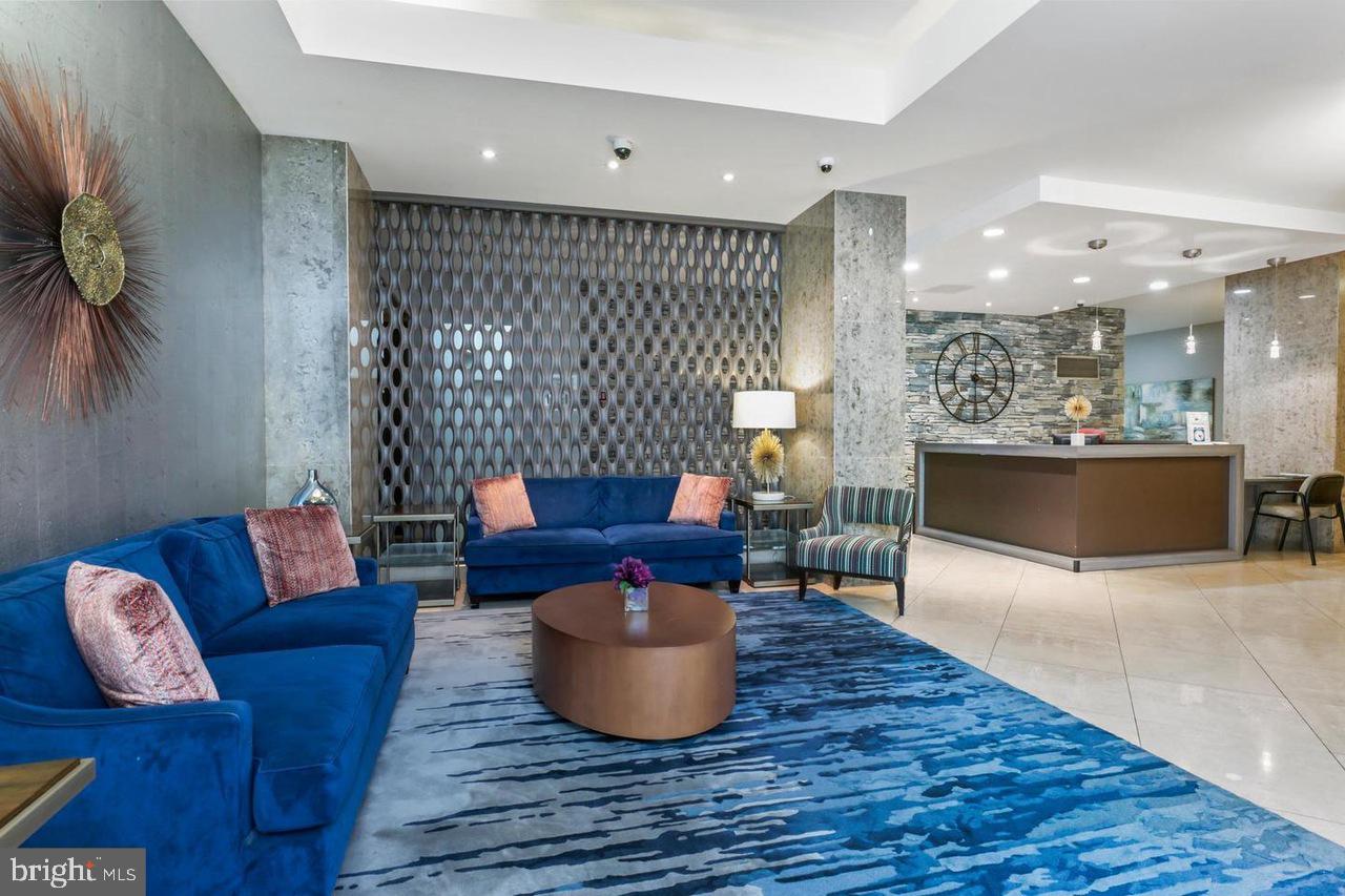 1011 Arlington Boulevard, Unit 930 Arlington, VA 22209 - Photo 24 of 42 a living room with furniture and a couch