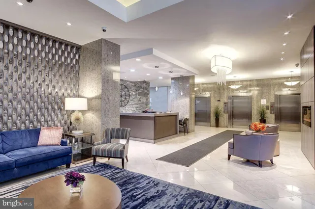 a view of a hallway with a furniture