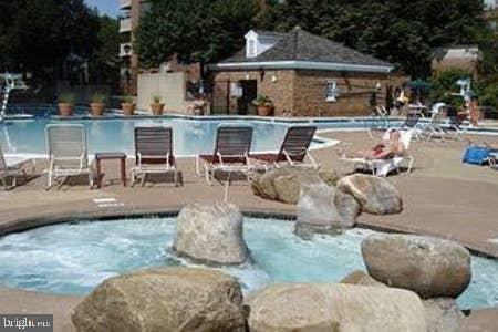 1011 Arlington Boulevard, Unit 930 Arlington, VA 22209 - Photo 34 of 42 a view of a house with backyard and sitting area