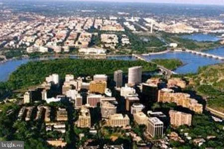a view of city with tall buildings