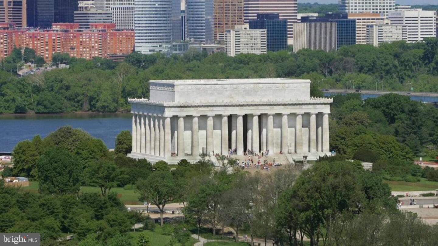 1011 Arlington Boulevard, Unit 930 Arlington, VA 22209 - Photo 38 of 42 a view of a house with pool and garden