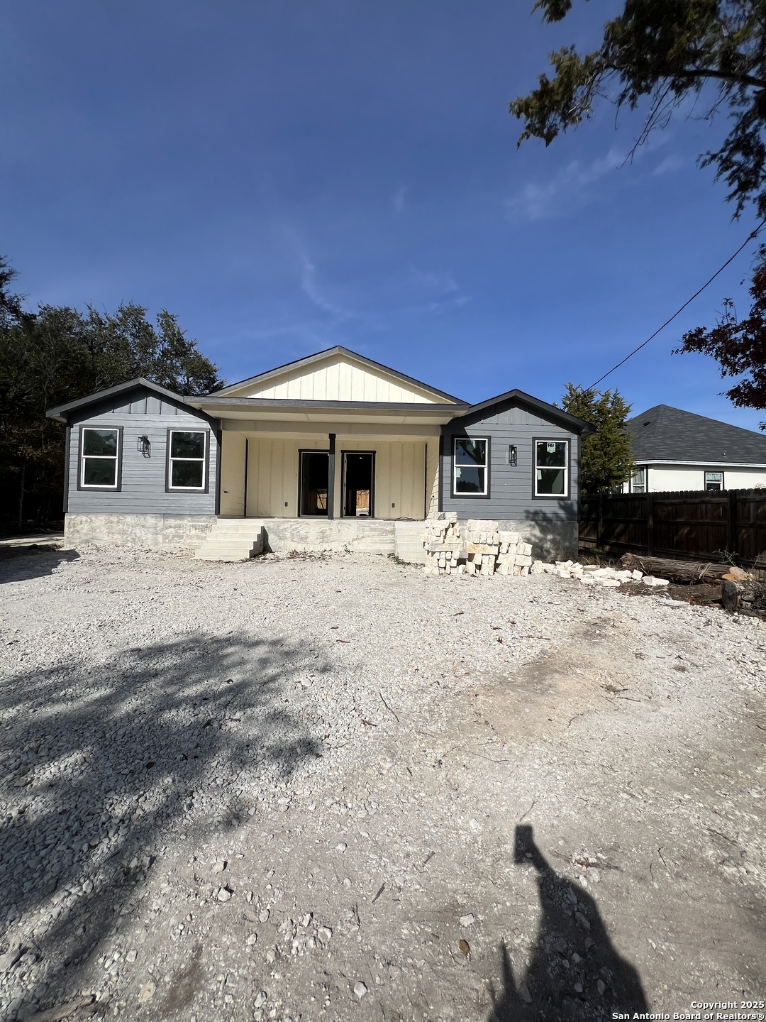 1197 Chisolm Trail Spring Branch, TX 78070 - Photo 10 of 10 a front view of a house with a yard