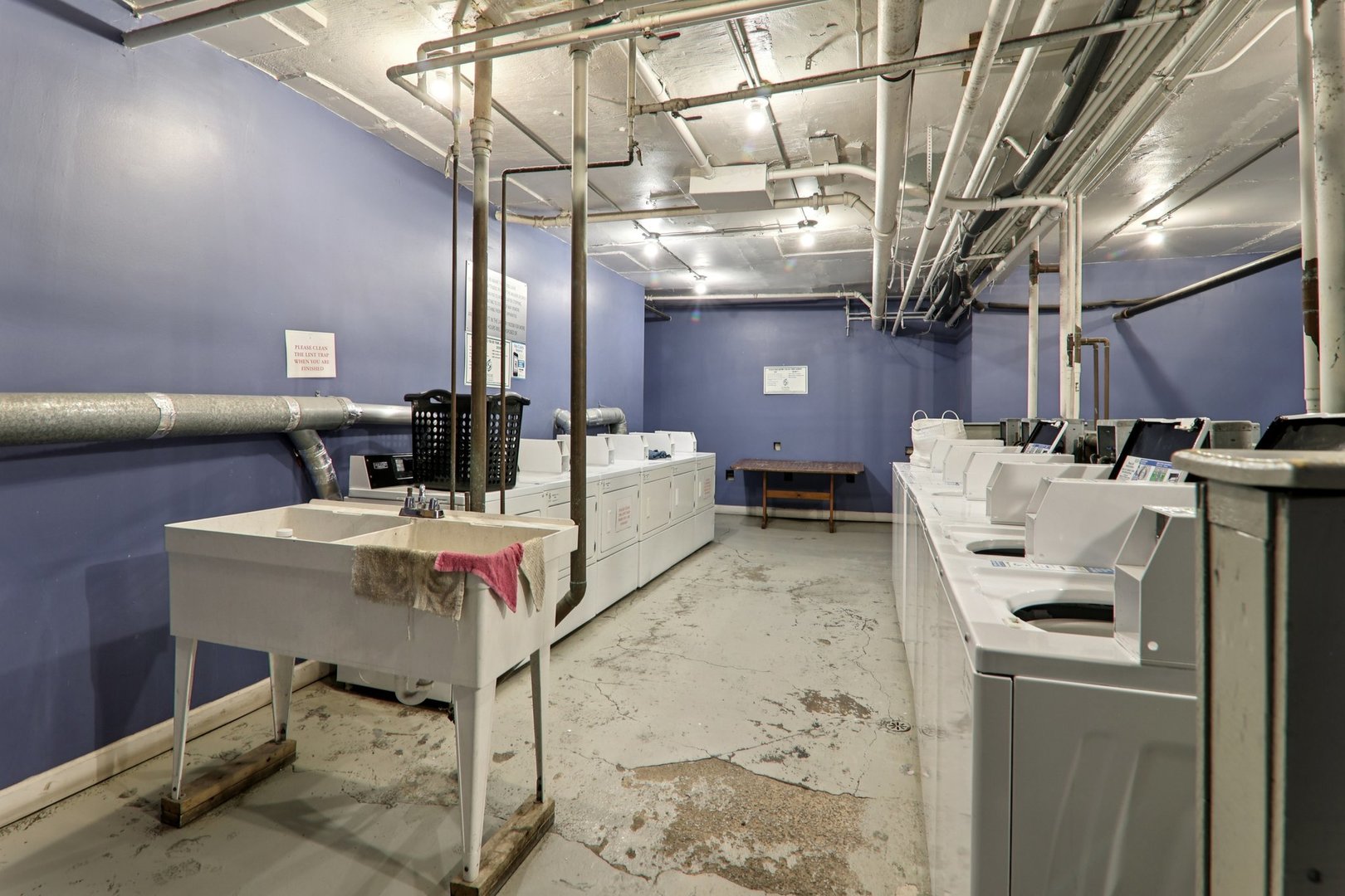 7023.5 North Sheridan Road, Unit 3S Chicago, IL 60626 - Photo 15 of 19 a utility room with dryer and washer