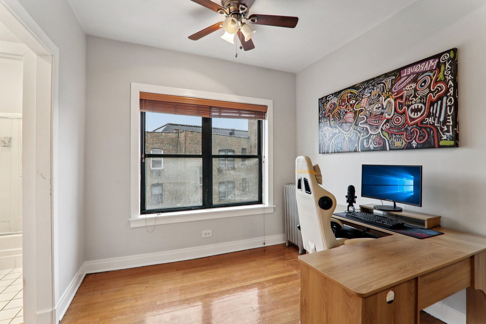 7023.5 North Sheridan Road, Unit 3S Chicago, IL 60626 - Photo 8 of 19 a workspace with furniture and window