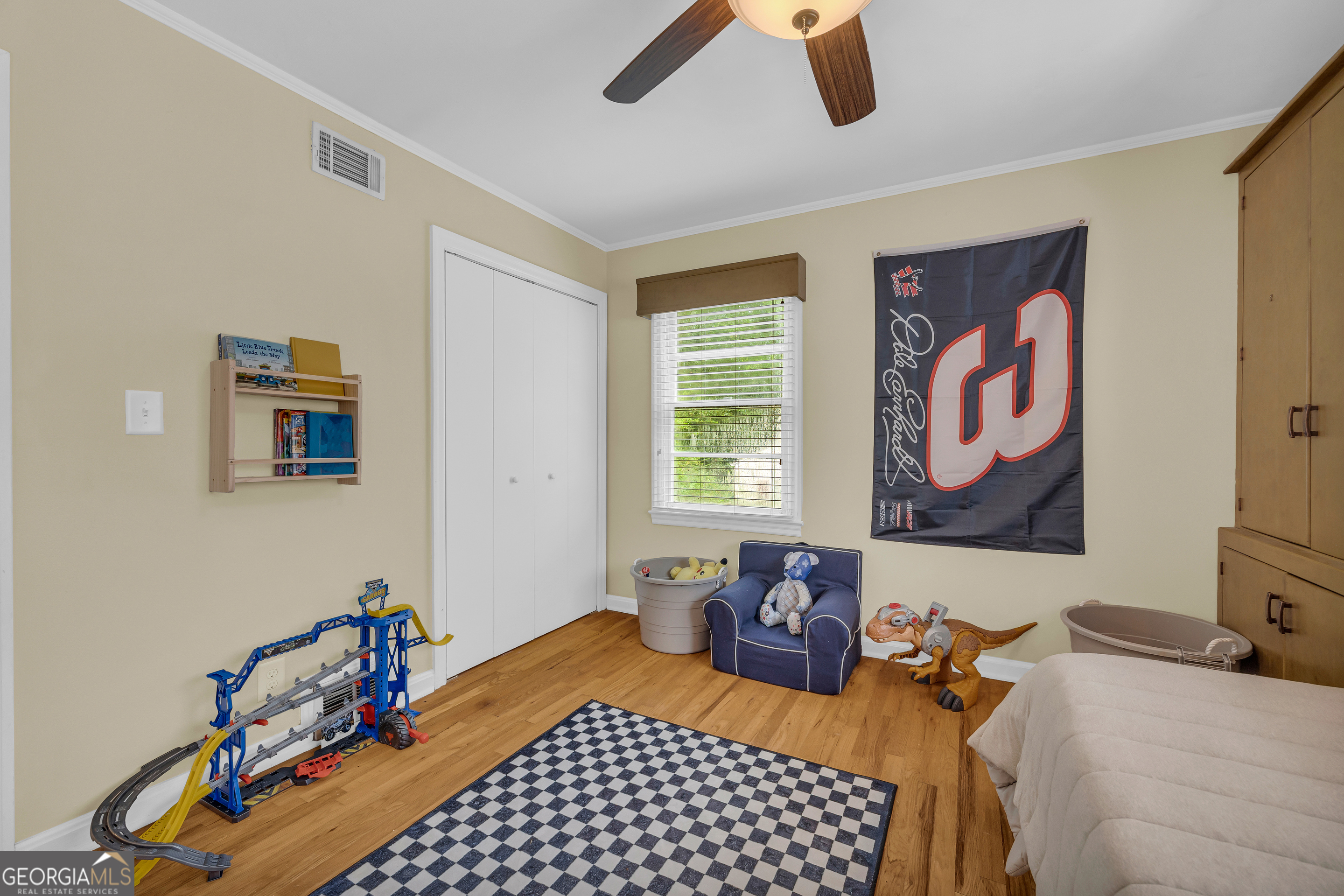 1168 Rosedale Street Toccoa, GA 30577 - Photo 19 of 23 a bedroom with a bed and wooden floor