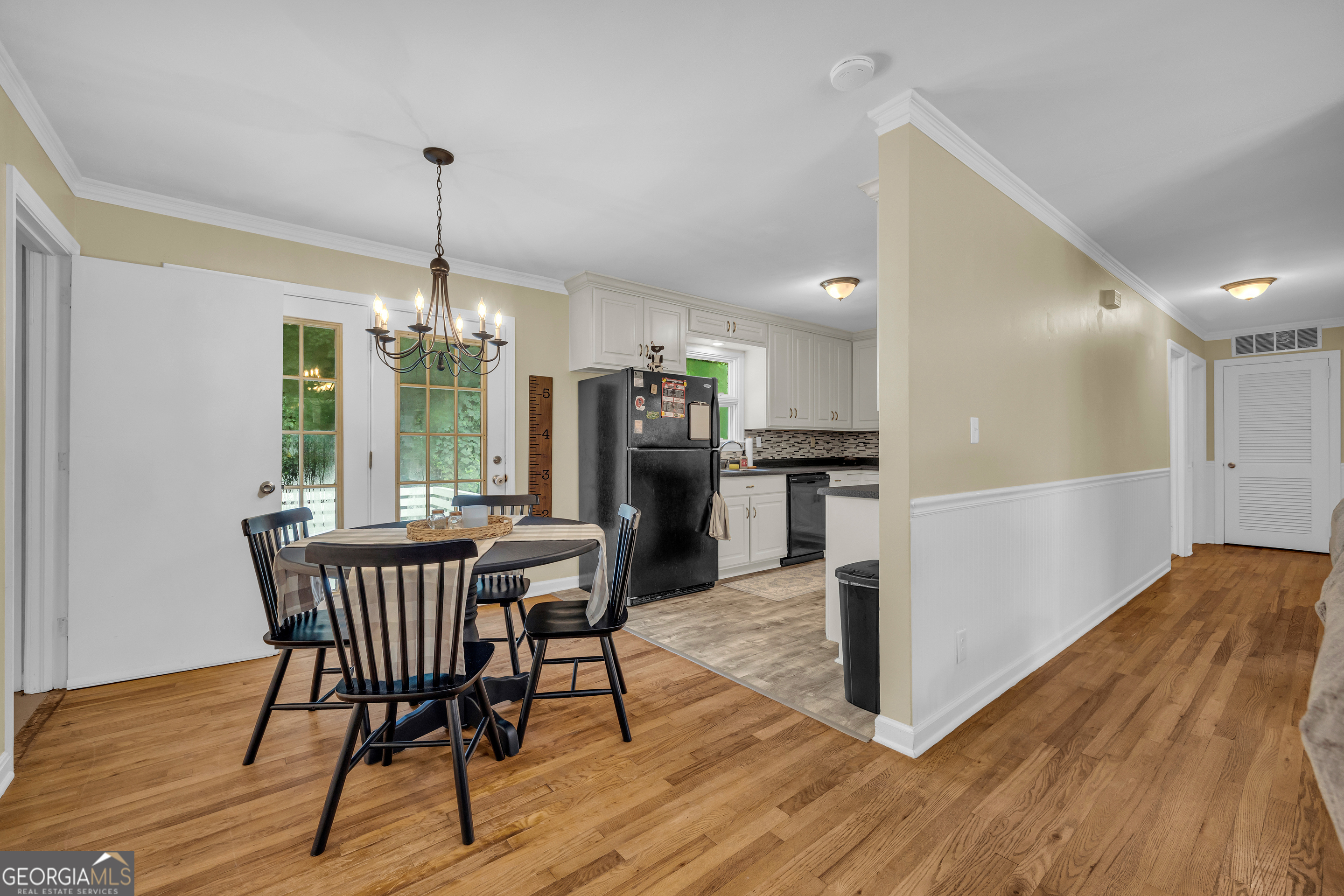 1168 Rosedale Street Toccoa, GA 30577 - Photo 9 of 23 a view of a dining room with furniture window and wooden floor