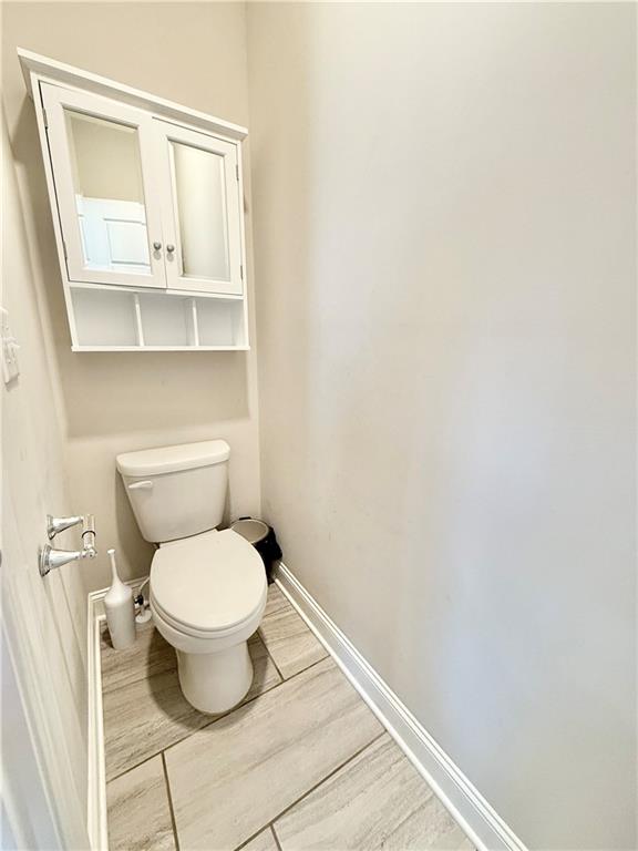 1817 Hislop Lane, Unit 7 Atlanta, GA 30345 - Photo 19 of 32 a bathroom with a toilet