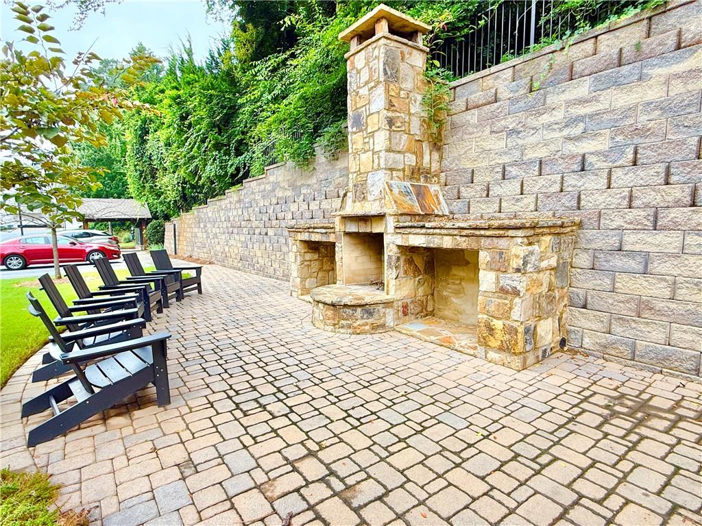 1817 Hislop Lane, Unit 7 Atlanta, GA 30345 - Photo 28 of 32 a building with trees in front of it