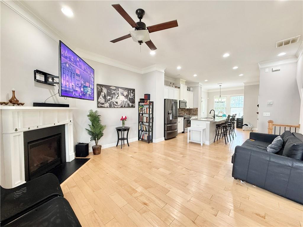 1817 Hislop Lane, Unit 7 Atlanta, GA 30345 - Photo 3 of 32 a living room with furniture and a fireplace