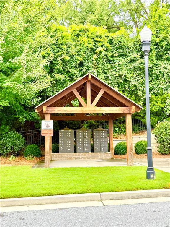 1817 Hislop Lane, Unit 7 Atlanta, GA 30345 - Photo 31 of 32 a front view of a house with a yard