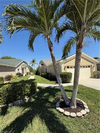 a view of a lake with a large building in the background