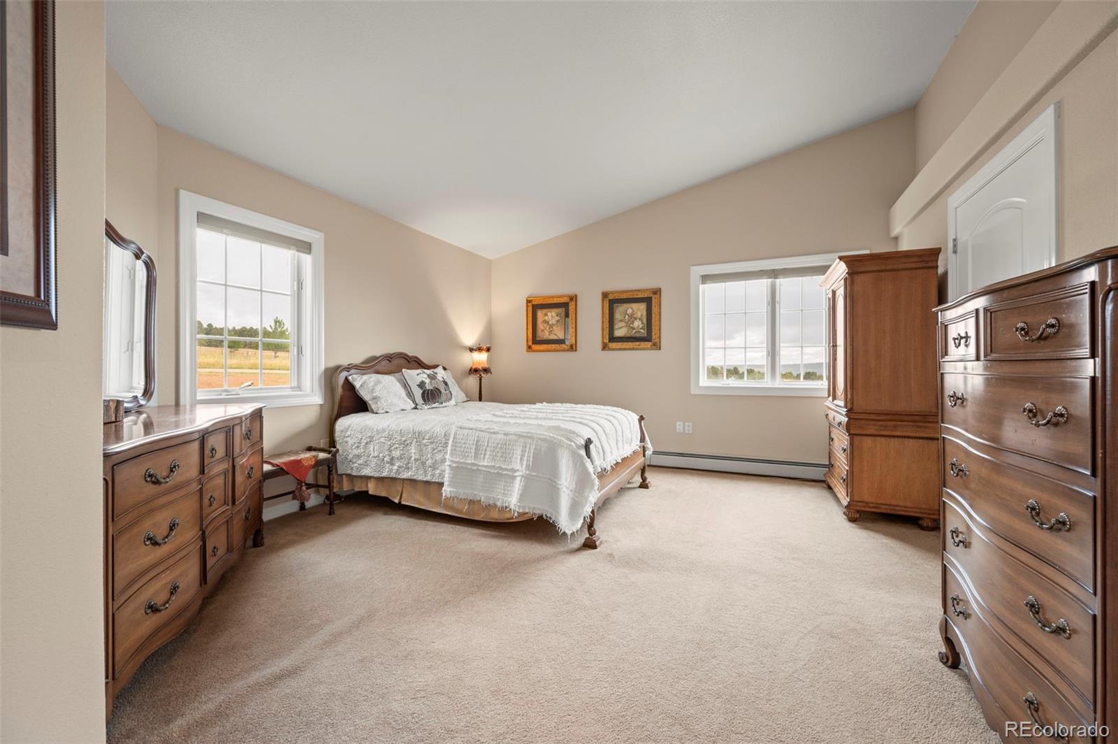 10650 Baxter Road Rye, CO 81069 - Photo 27 of 50 a bedroom with a bed and a dresser