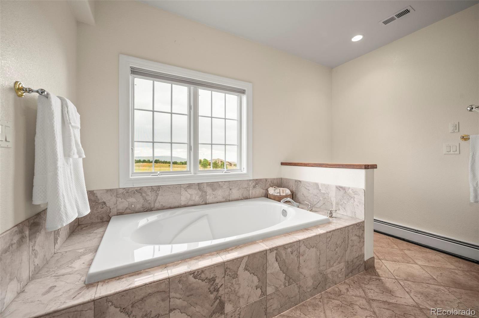 10650 Baxter Road Rye, CO 81069 - Photo 30 of 50 a spacious bathroom with bathtub and a bathtub