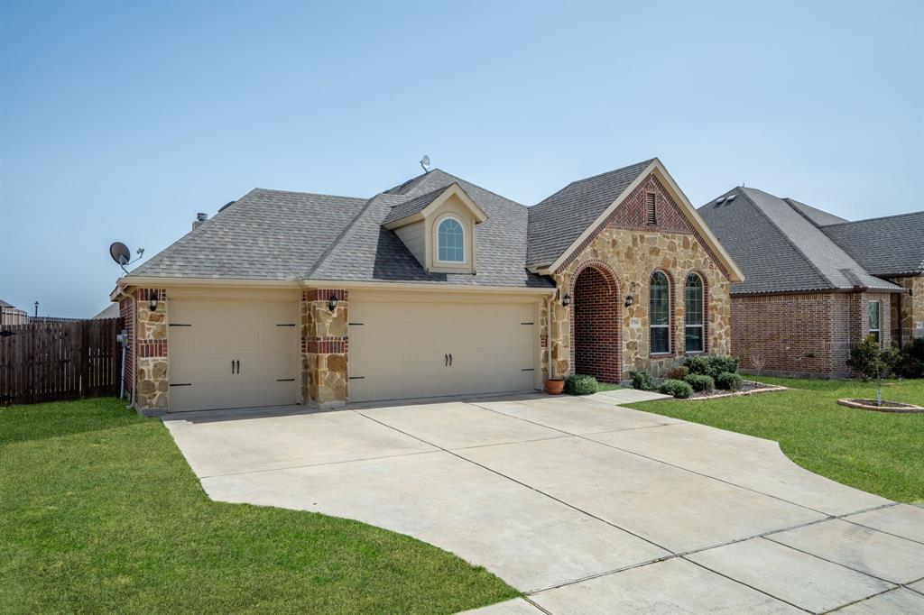 3724 Ranchers Ridge Krum, TX 76249 - Photo 2 of 32 Well-designed home features a freshly paintedepoxy-coated 3-car garage!