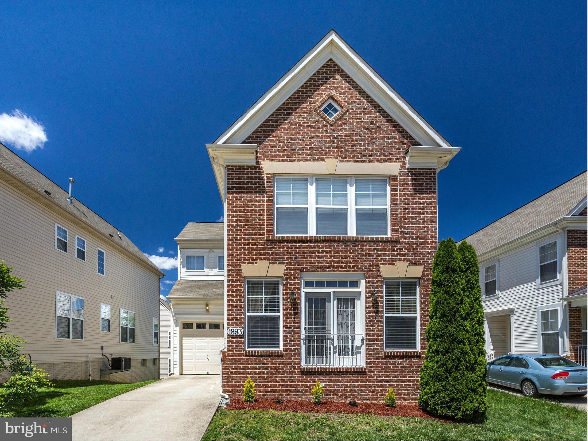 1893 Scaffold Way Odenton, MD 21113 - Photo 1 of 22 a front view of a house with a yard