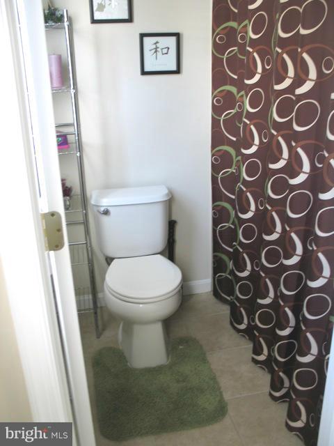 1893 Scaffold Way Odenton, MD 21113 - Photo 18 of 22 a white toilet sitting next to a small bathroom