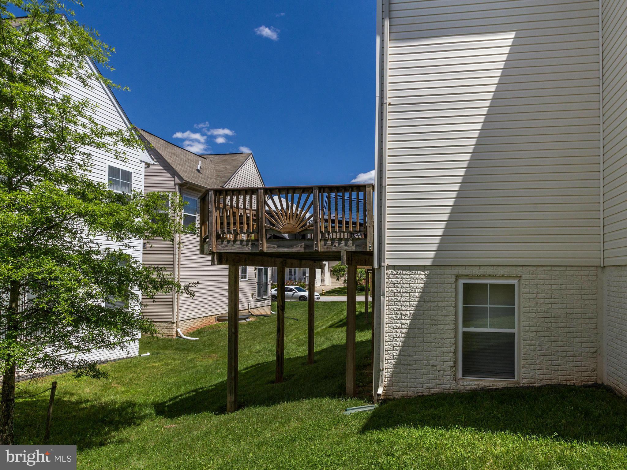 1893 Scaffold Way Odenton, MD 21113 - Photo 20 of 22 a view of a house with a backyard