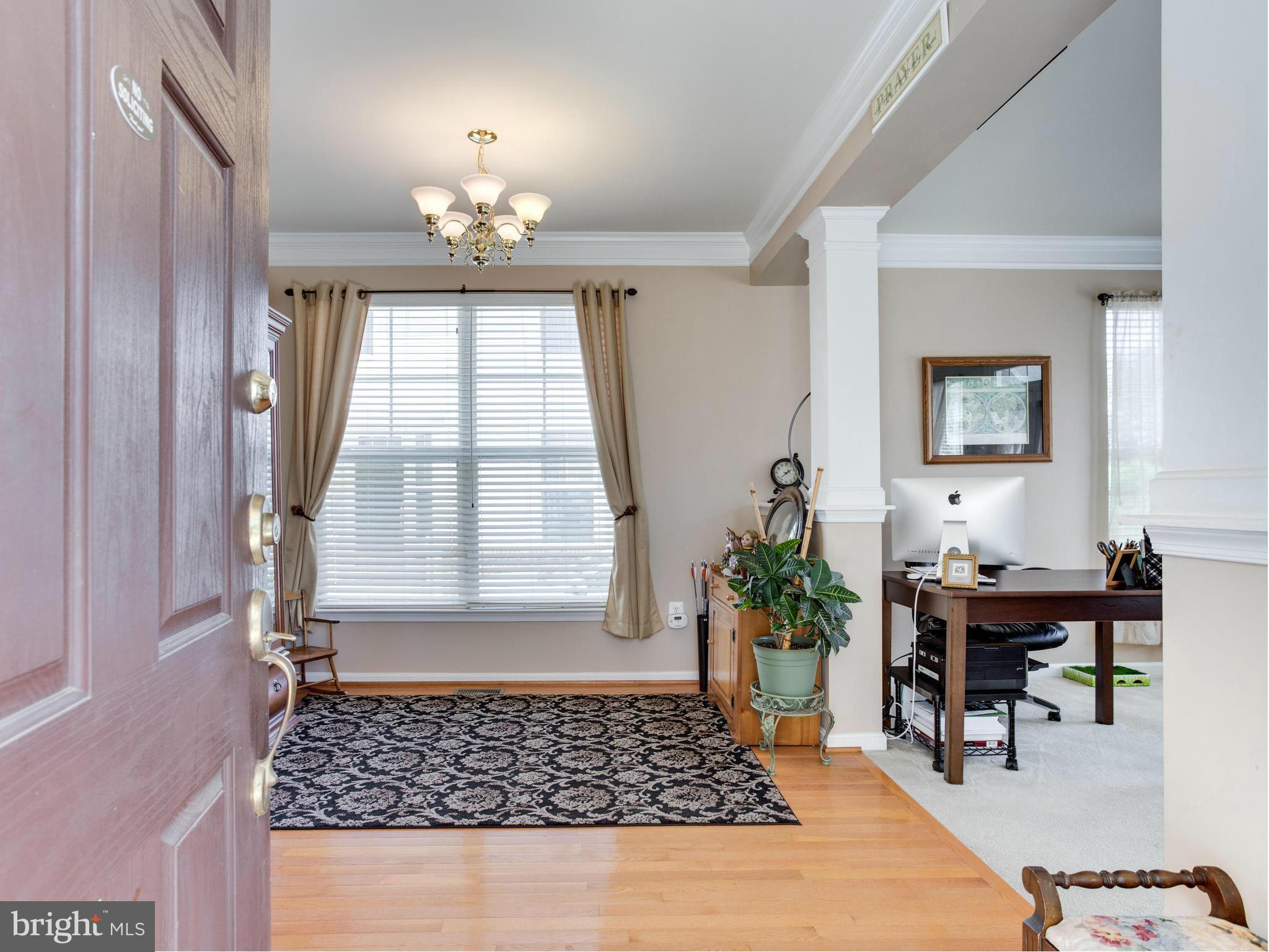 1893 Scaffold Way Odenton, MD 21113 - Photo 3 of 22 a living room with furniture and a chandelier
