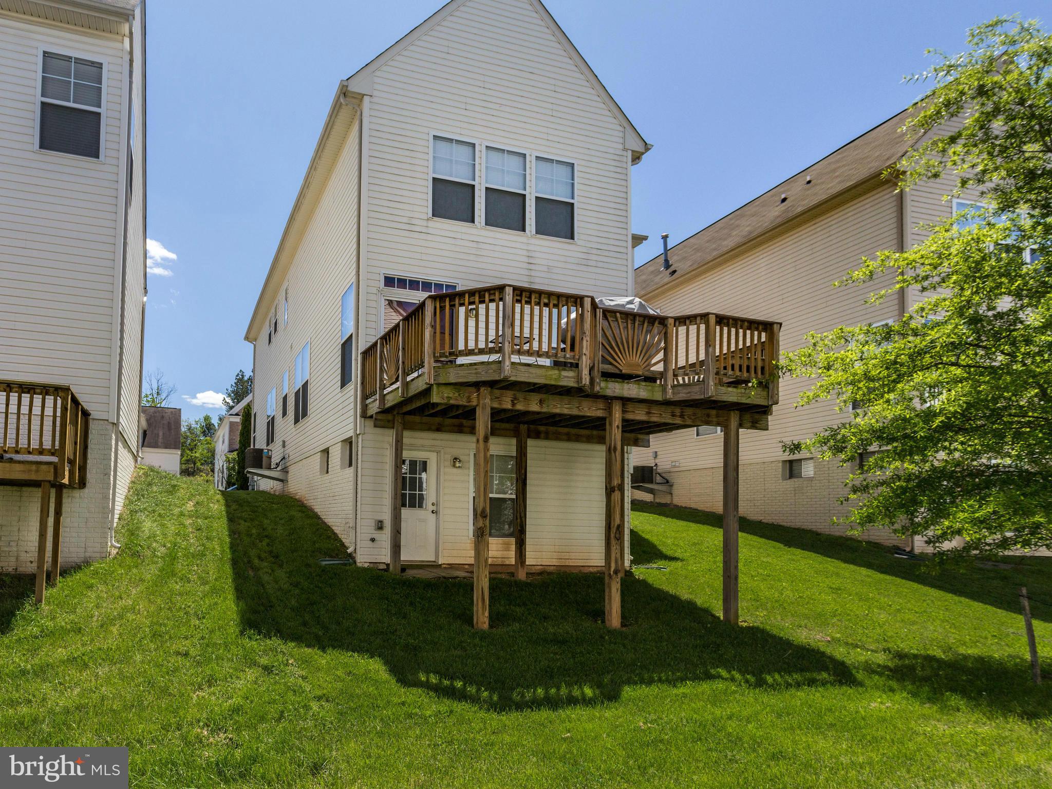 1893 Scaffold Way Odenton, MD 21113 - Photo 22 of 22 a view of a house with a yard