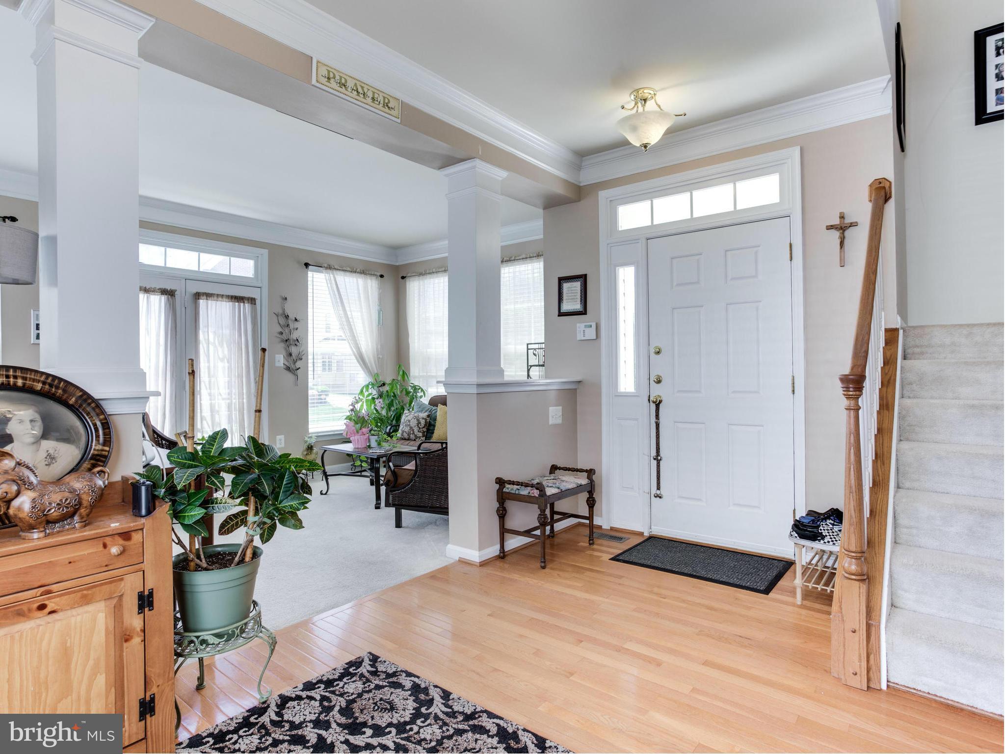 1893 Scaffold Way Odenton, MD 21113 - Photo 4 of 22 a room with furniture and a potted plant
