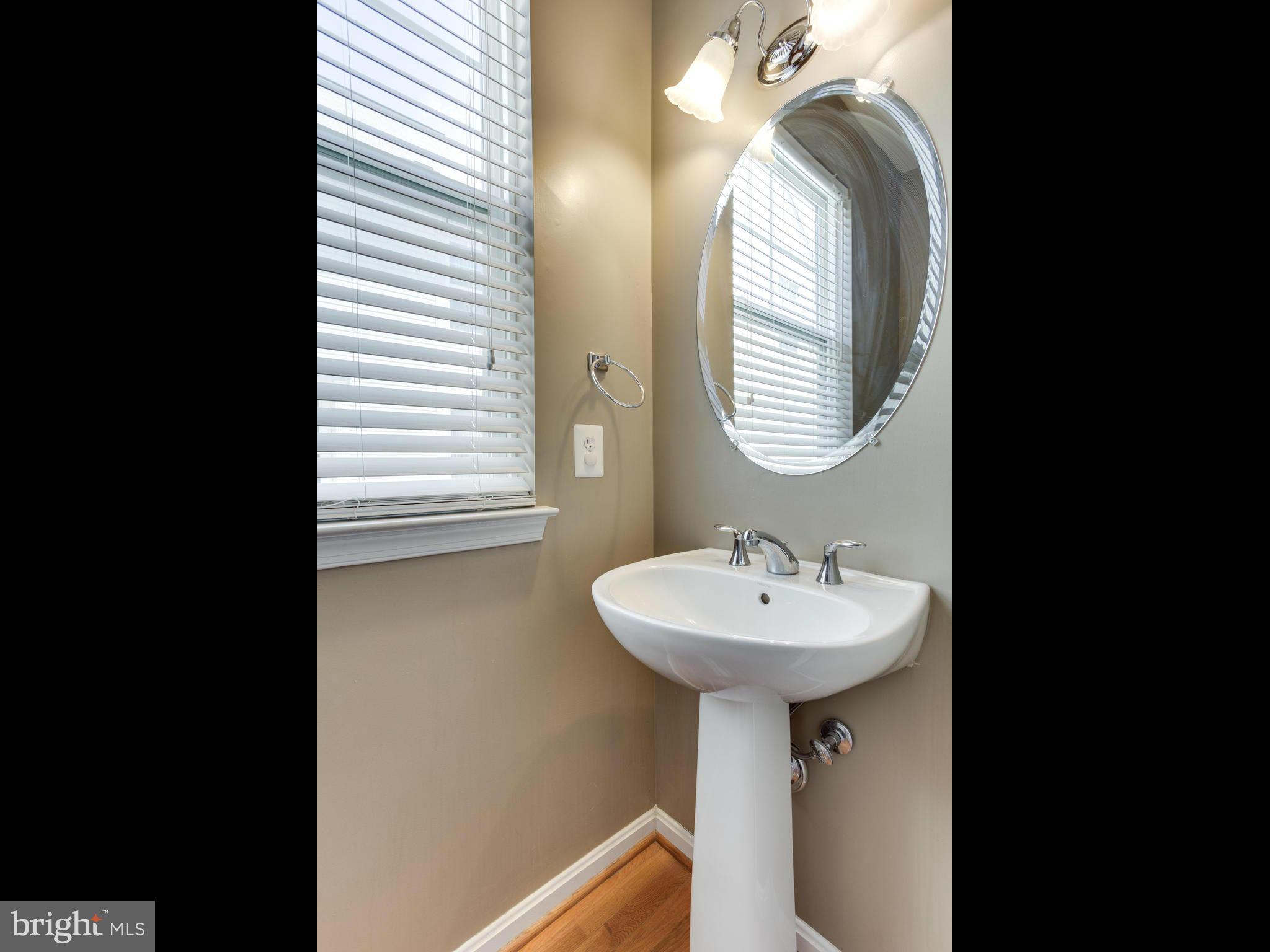 1893 Scaffold Way Odenton, MD 21113 - Photo 7 of 22 a bathroom with a sink and a mirror