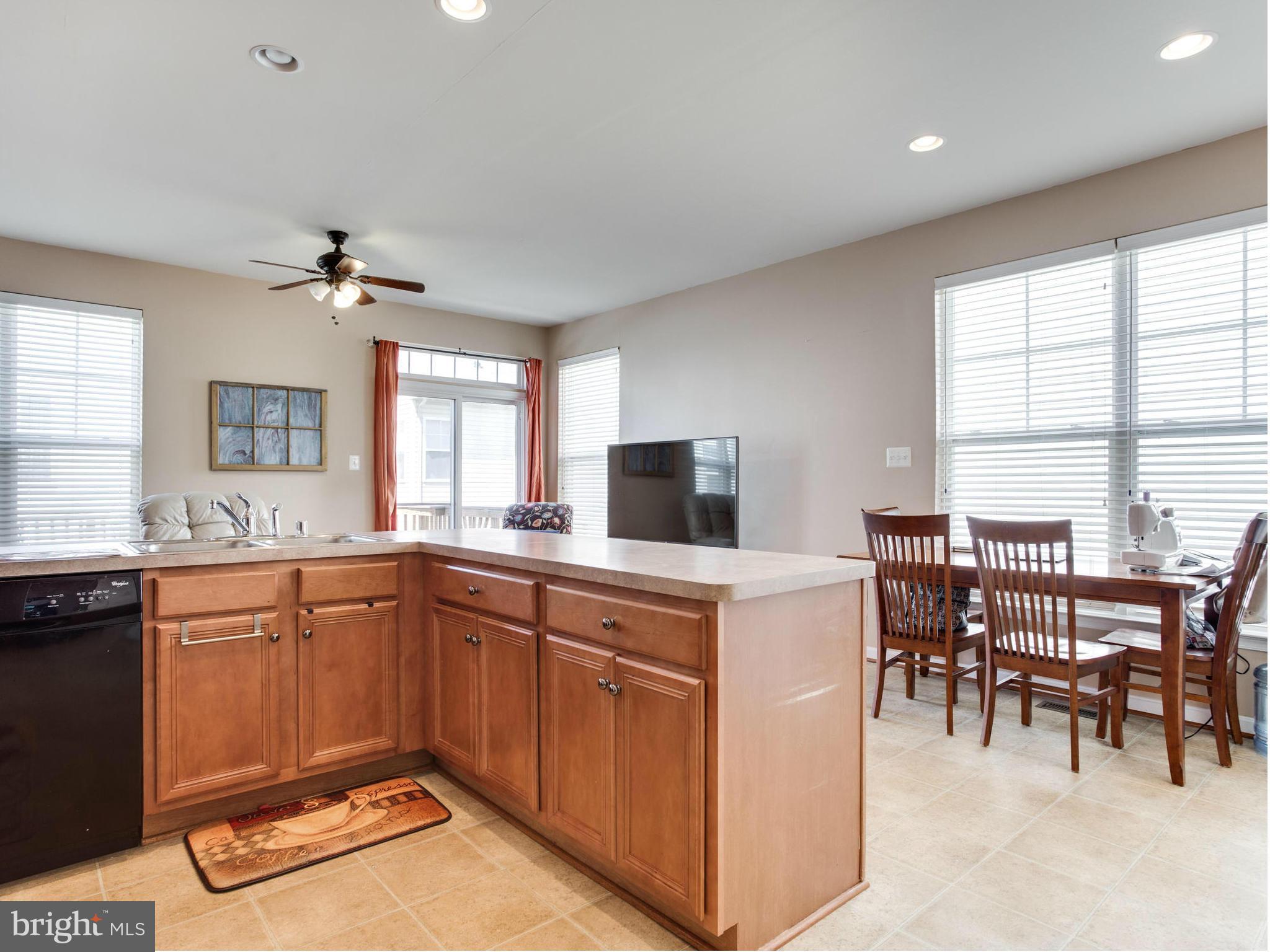 1893 Scaffold Way Odenton, MD 21113 - Photo 9 of 22 a kitchen with a sink stove and cabinets