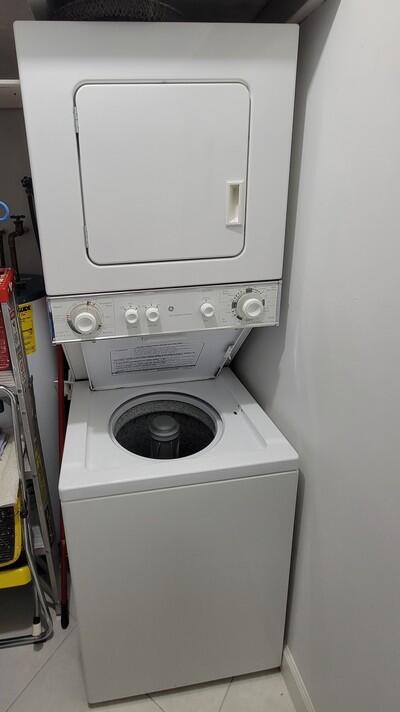 6699 Northwest 2nd Avenue, Unit PHI Boca Raton, FL 33487 - Photo 32 of 33 a close up view of washer and dryer