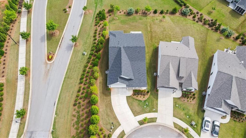 2457 Naples Street Hoschton, GA 30548 - Photo 2 of 41 aerial view of a house with a swimming pool