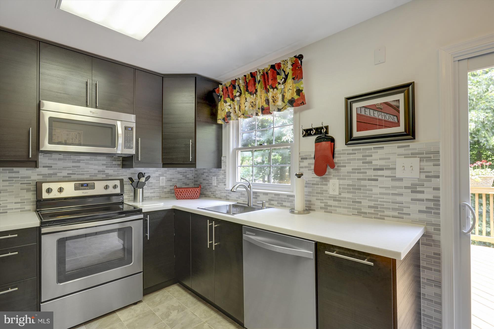 8428 Springfield Oaks Drive Springfield, VA 22153 - Photo 2 of 30 Bright kitchen w/ treed view from window