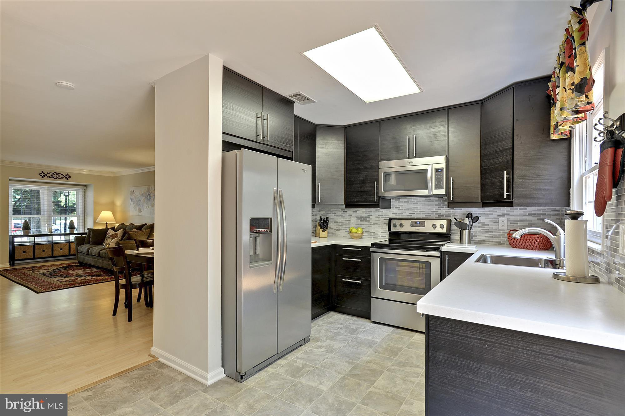 8428 Springfield Oaks Drive Springfield, VA 22153 - Photo 10 of 30 Gorgeous renovated kitchen w/ cabinets to ceiling
