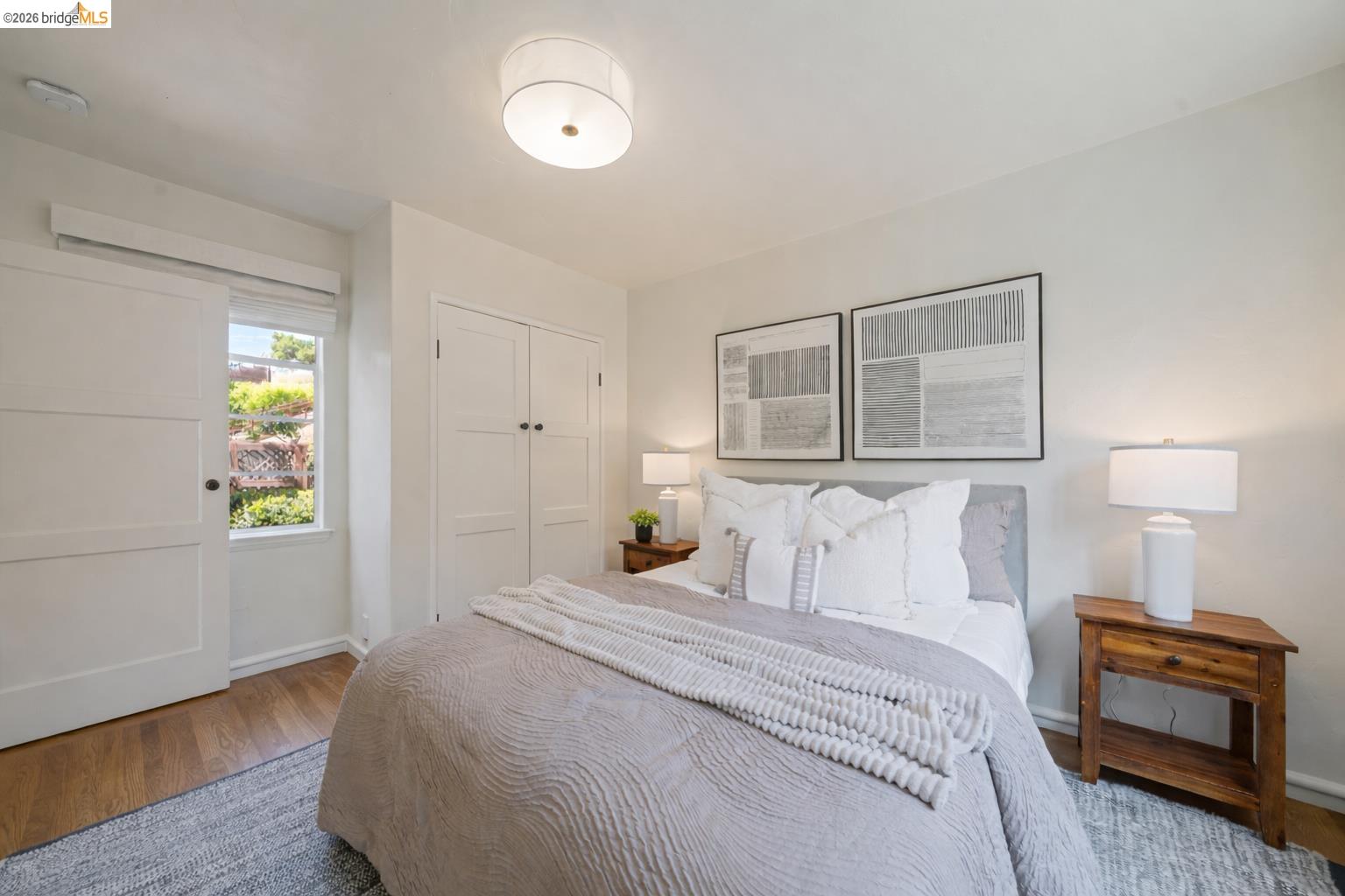 1170 Sterling Avenue Berkeley, CA 94708 - Photo 21 of 52 Bedroom featuring wood finished floors and a closet