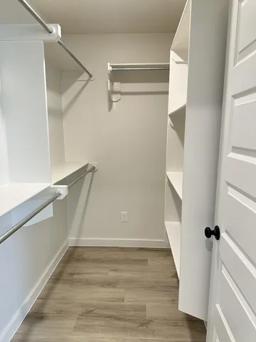 a view of an empty walk in closet