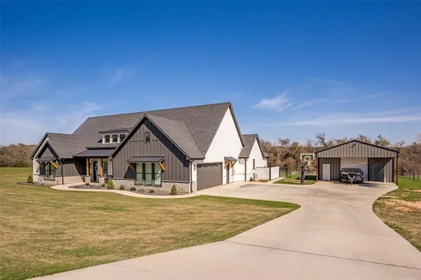 a house with trees in front of it