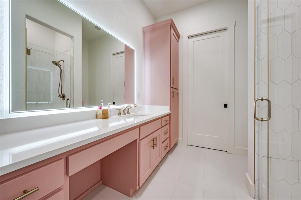 123 Proctor Lane Decatur, TX 76234 - Photo 11 of 25 a bathroom with a double vanity sink and mirror