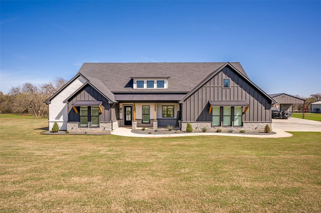 123 Proctor Lane Decatur, TX 76234 - Photo 2 of 25 a view of a house with swimming pool and sitting area