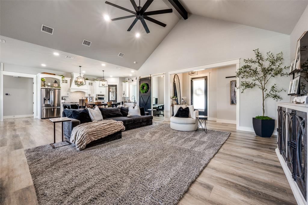 123 Proctor Lane Decatur, TX 76234 - Photo 4 of 25 a living room with furniture and a fireplace